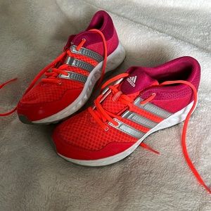 Adidas running shoes, size 6.5. Bright orange and fuscia with silver stripes.